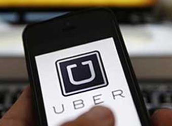 Uber drivers in US join protest for minimum wage